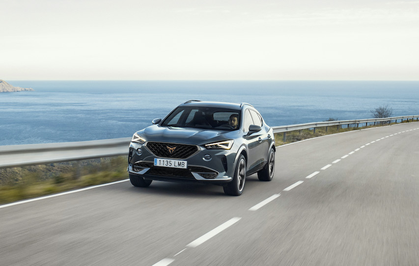 Cupra Formento e-hybrid exterior front driving by sea